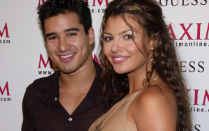 Mario Lopez and Ali Landry smiling on cameras